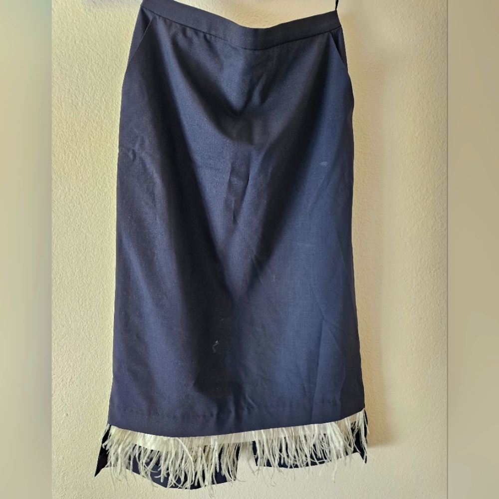 Suiting fabric with feather trim